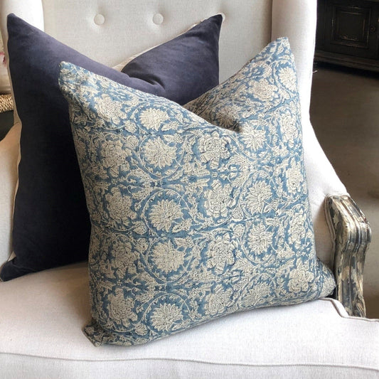 Indulge in the beauty of the Paradise Block Print Linen Blue Cushion designed by renowned Swedish interior and fashion brand, Chamois. This luxurious cushion features a classic Indian block print design and is crafted with premium Belgian linen for exceptional quality and long lasting elegance. Includes a soft feather insert for added comfort.