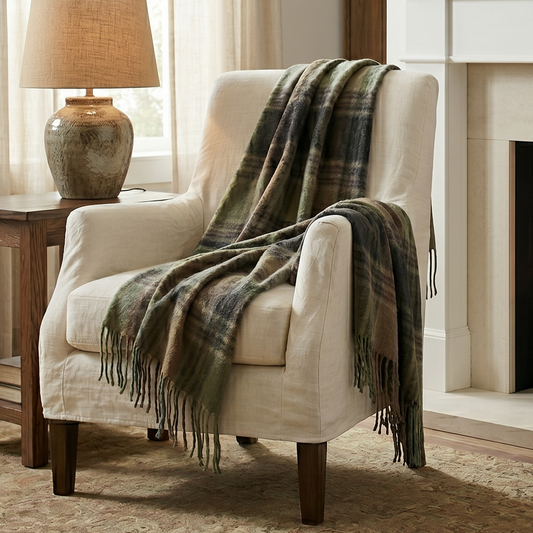 Cozy living room with a fireplace, armchair, and decorative elements.