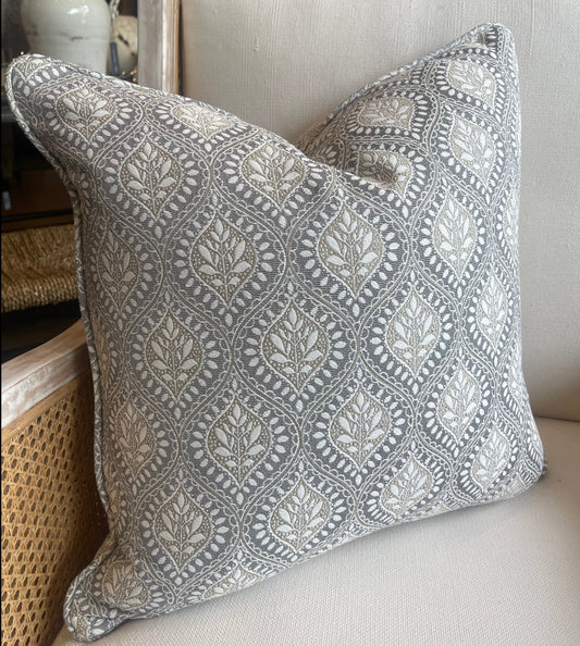 This distinguished heavyweight Geometric Taupe Grey Cushion, boasting a refined geometric pattern crafted by esteemed fabric house Warwick Fabrics, brings a touch of elegance to any environment. Merging subtle neutral tones, the cushion is complete with a plush feather insert for maximum comfort.