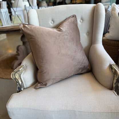 Indulge in the softness of our Mocca Velvet Cushion. This cushion adds style and luxury to any space, and comes with a concealed zipper for easy use. Filled with feather inserts for ultimate comfort and machine washable on a delicate cycle.