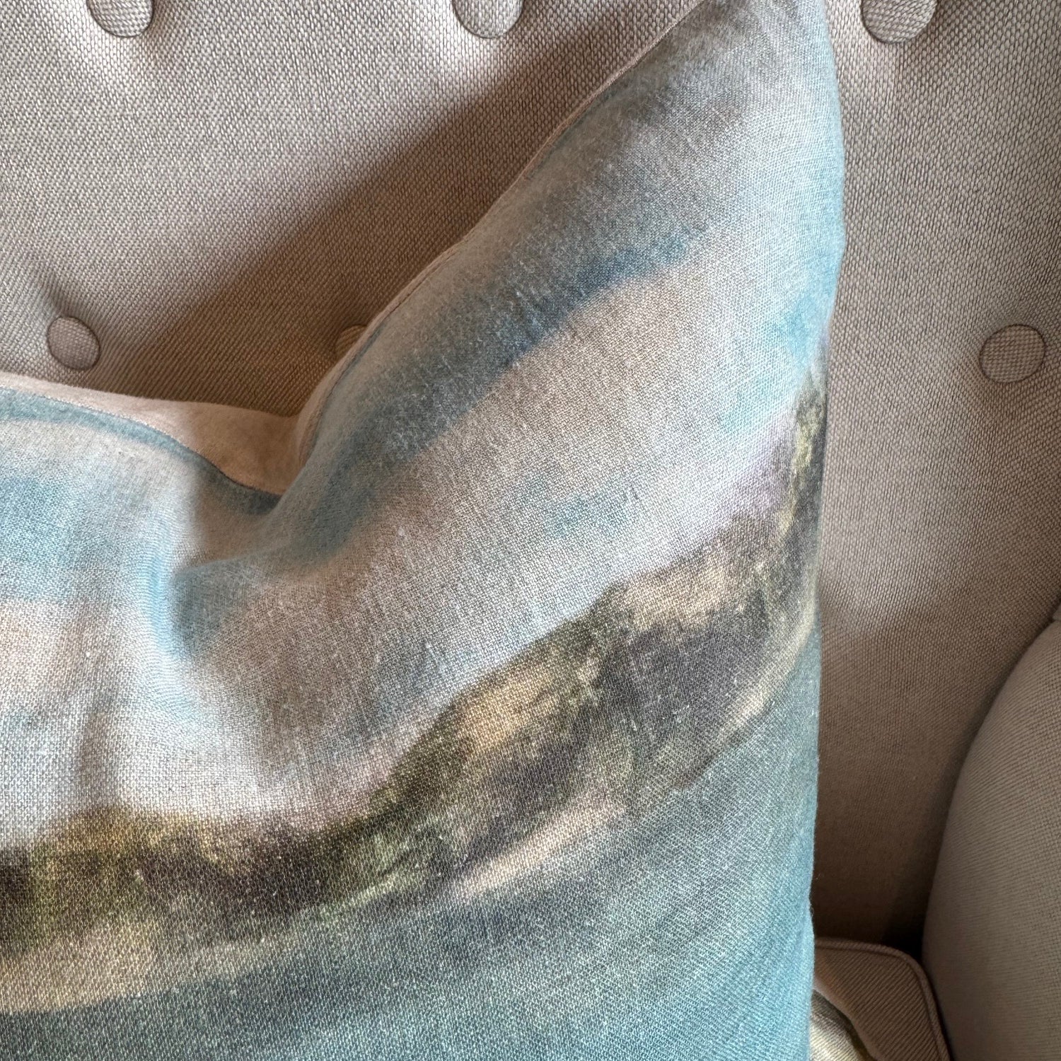 Indulge in the breath taking beauty of a tranquil beach landscape with the Island Summer Linen Cushion. Handcrafted by a local Auckland artist, the serene blues and soft hues capture the essence of New Zealand's rural settings. Perfect for any chair, this cushion is made from luxurious French organic linen and includes a feather filled insert for added comfort.