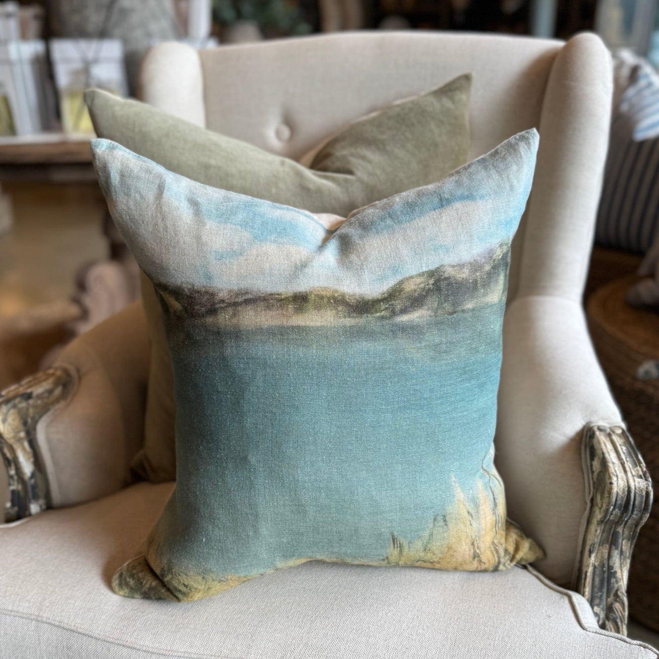 Experience the paradise of New Zealand with the Island Summer Linen Cushion. Meticulously hand-painted by a local artist, this cushion beautifully captures the tranquil blue hues and soft tones of the country's rural landscapes. Made with 100% French linen, it comes with a feather insert for maximum coziness and a plain reverse side for natural simplicity.