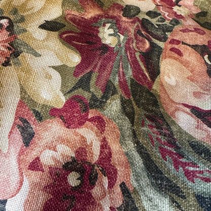 Elevate your home decor this season with the eye-catching Maree Floral Cushion. Be mesmerized by the beautiful floral patterns in rich pinks, greens, and burgundy against a deep background, making it the perfect centerpiece for any room. Its soft and cozy feather-filled insert offers both comfort and style.