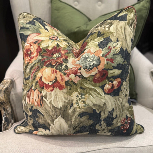 Elevate your home decor this season with the eye-catching Maree Floral Cushion. Be mesmerized by the beautiful floral patterns in rich pinks, greens, and burgundy against a deep background, making it the perfect centerpiece for any room. Its soft and cozy feather-filled insert offers both comfort and style.