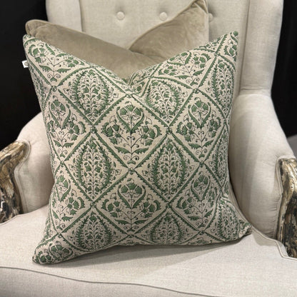 Indulge in the exquisite Jaipur Green Block Print Linen Cushion by Swedish Designer CHAMOIS. This luxurious accent showcases an intricate Indian block print pattern on sumptuous 100% Belgian linen, creating an unparalleled statement piece for your home. The premium feather insert provides exceptional comfort while the durable fabric ensures lasting beauty. Transform your interior with this sophisticated 50cm x 50cm cushion that perfectly balances artisanal craftsmanship with contemporary elegance.