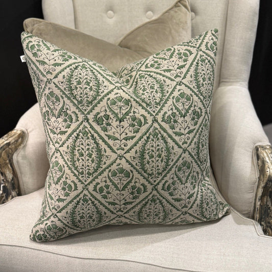 Indulge in the exquisite Jaipur Green Block Print Linen Cushion by Swedish Designer CHAMOIS. This luxurious accent showcases an intricate Indian block print pattern on sumptuous 100% Belgian linen, creating an unparalleled statement piece for your home. The premium feather insert provides exceptional comfort while the durable fabric ensures lasting beauty. Transform your interior with this sophisticated 50cm x 50cm cushion that perfectly balances artisanal craftsmanship with contemporary elegance.