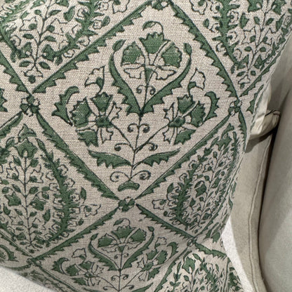 Indulge in the exquisite Jaipur Green Block Print Linen Cushion by Swedish Designer CHAMOIS. This luxurious accent showcases an intricate Indian block print pattern on sumptuous 100% Belgian linen, creating an unparalleled statement piece for your home. The premium feather insert provides exceptional comfort while the durable fabric ensures lasting beauty. Transform your interior with this sophisticated 50cm x 50cm cushion that perfectly balances artisanal craftsmanship with contemporary elegance.