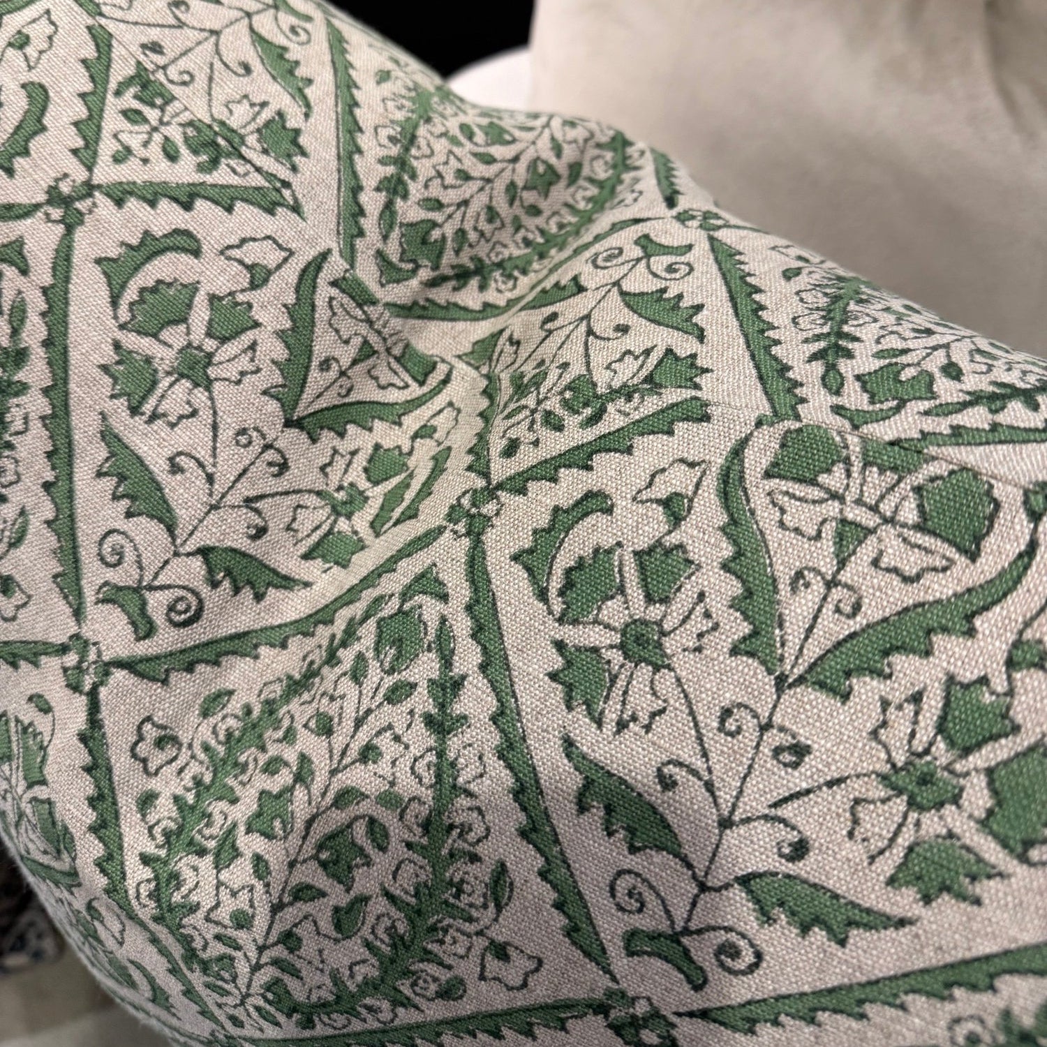 Indulge in the exquisite Jaipur Green Block Print Linen Cushion by Swedish Designer CHAMOIS. This luxurious accent showcases an intricate Indian block print pattern on sumptuous 100% Belgian linen, creating an unparalleled statement piece for your home. The premium feather insert provides exceptional comfort while the durable fabric ensures lasting beauty. Transform your interior with this sophisticated 50cm x 50cm cushion that perfectly balances artisanal craftsmanship with contemporary elegance.