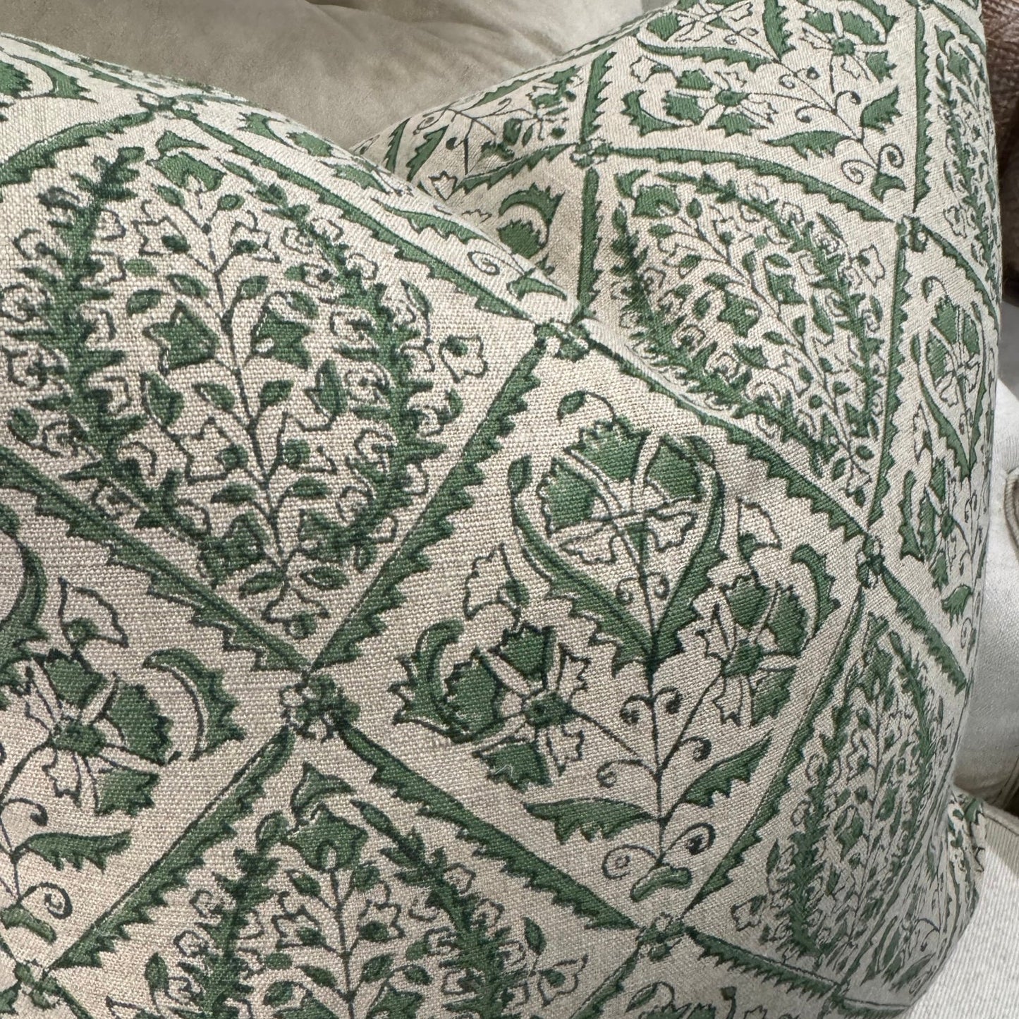 Indulge in the exquisite Jaipur Green Block Print Linen Cushion by Swedish Designer CHAMOIS. This luxurious accent showcases an intricate Indian block print pattern on sumptuous 100% Belgian linen, creating an unparalleled statement piece for your home. The premium feather insert provides exceptional comfort while the durable fabric ensures lasting beauty. Transform your interior with this sophisticated 50cm x 50cm cushion that perfectly balances artisanal craftsmanship with contemporary elegance.