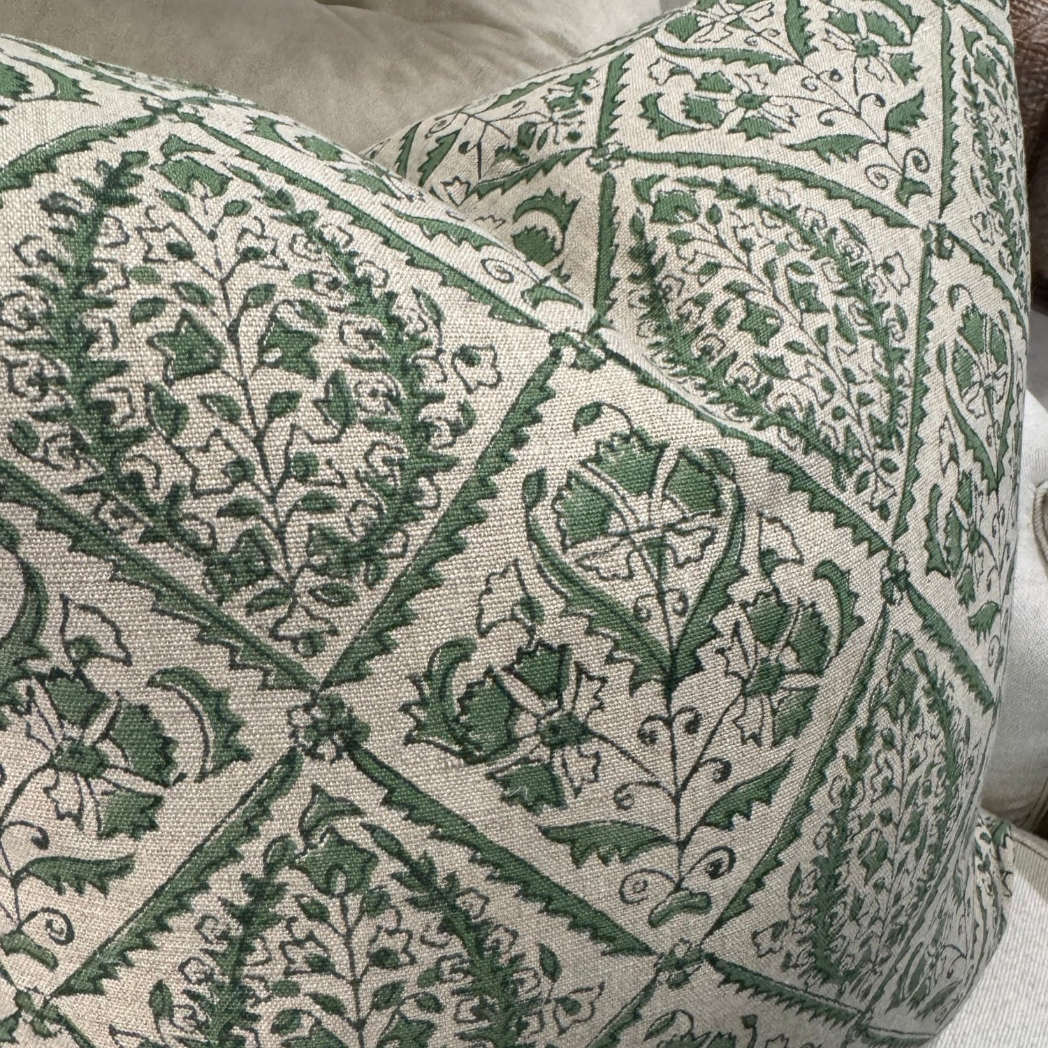 Indulge in the exquisite Jaipur Green Block Print Linen Cushion by Swedish Designer CHAMOIS. This luxurious accent showcases an intricate Indian block print pattern on sumptuous 100% Belgian linen, creating an unparalleled statement piece for your home. The premium feather insert provides exceptional comfort while the durable fabric ensures lasting beauty. Transform your interior with this sophisticated 50cm x 50cm cushion that perfectly balances artisanal craftsmanship with contemporary elegance.