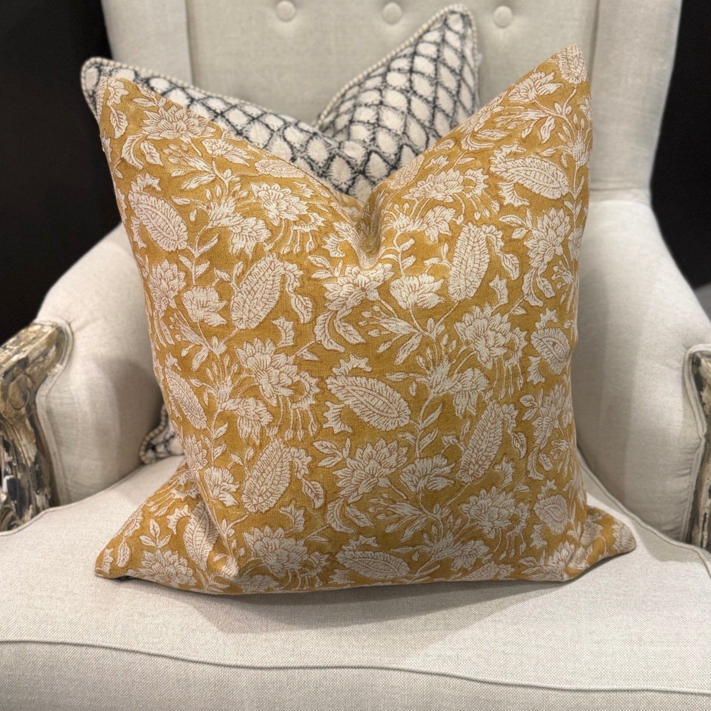 Transform your home decor with the exquisite CHAMOIS Jodhpur Ochre Block Print Linen Cushion. Made with premium Belgian linen and a striking Indian block print pattern, this cushion exudes luxury and durability. With a plush feather insert, experience the beauty and quality of this stunning piece from CHAMOIS.