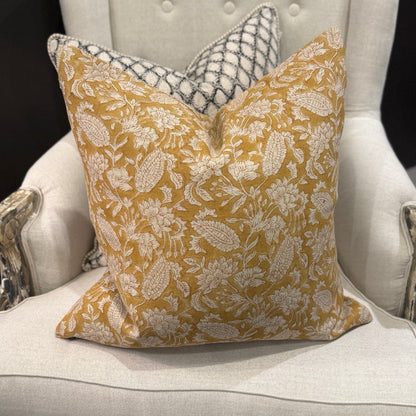Transform your home decor with the exquisite CHAMOIS Jodhpur Ochre Block Print Linen Cushion. Made with premium Belgian linen and a striking Indian block print pattern, this cushion exudes luxury and durability. With a plush feather insert, experience the beauty and quality of this stunning piece from CHAMOIS.