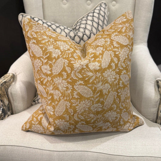 Transform your home decor with the exquisite CHAMOIS Jodhpur Ochre Block Print Linen Cushion. Made with premium Belgian linen and a striking Indian block print pattern, this cushion exudes luxury and durability. With a plush feather insert, experience the beauty and quality of this stunning piece from CHAMOIS.