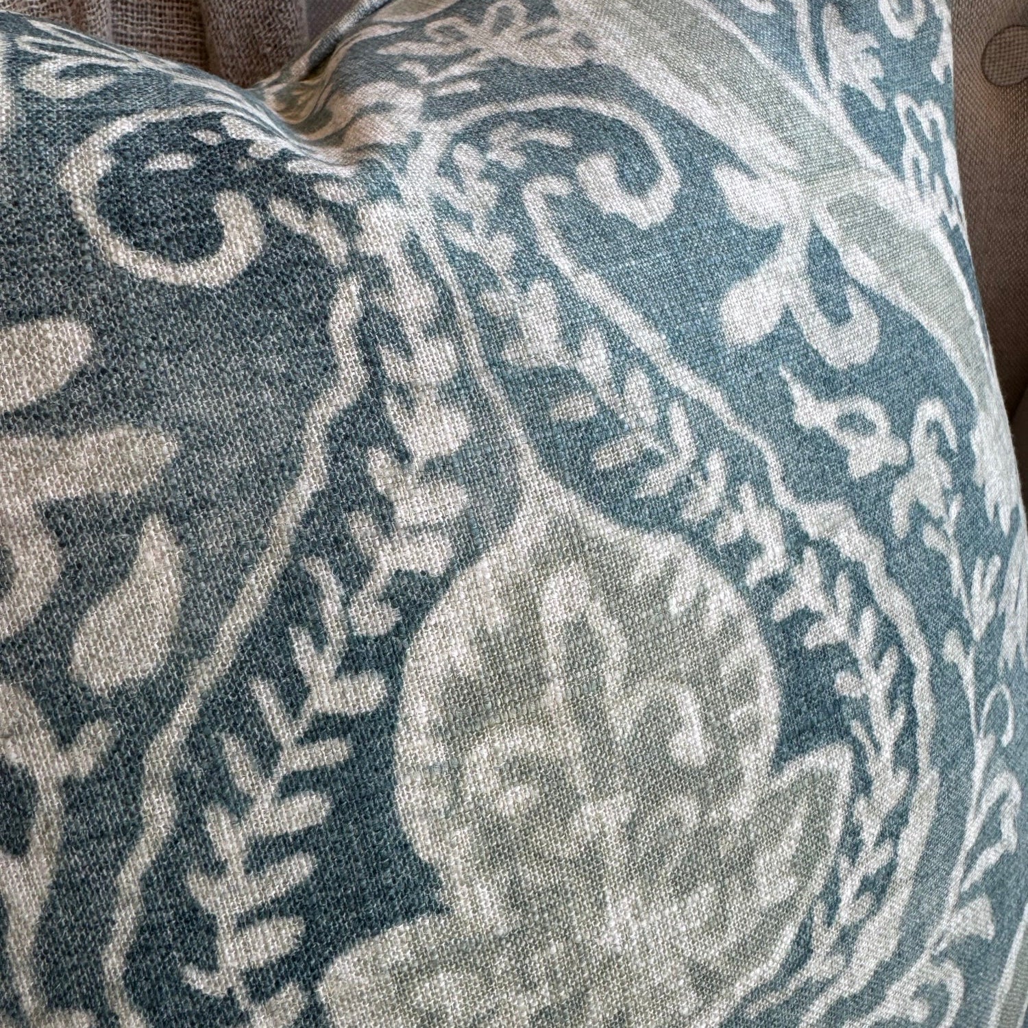 The Florentine Teal & Sage Cushion in sturdy linen blend with feather fill adds elegance, comfort & refined style to any sofa, chair, or bedroom.