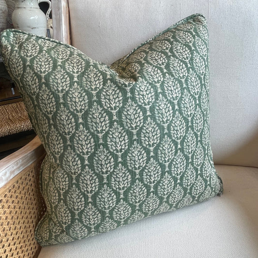 Crafted from Slender Morris' sumptuous heavyweight linen cotton blend fabric, this stand-out Spruce Green Kemble Patterned Cushion displays a rich green base adorned with delicate pastel tones, creating an elegant and graceful accompaniment to your plush home decor.