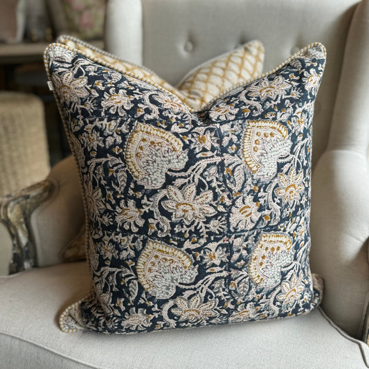 Experience the exquisite charm of the Oriental Block Printed Linen Navy Cushion, crafted by the renowned Swedish brand, Chamois. Hand block printed on premium Belgian 100% linen, this cushion offers a plush, inviting texture. Its versatile design complements various colour schemes, and the elegant piped edges add a touch of luxury. For ultimate comfort, it comes with a soft feather insert.