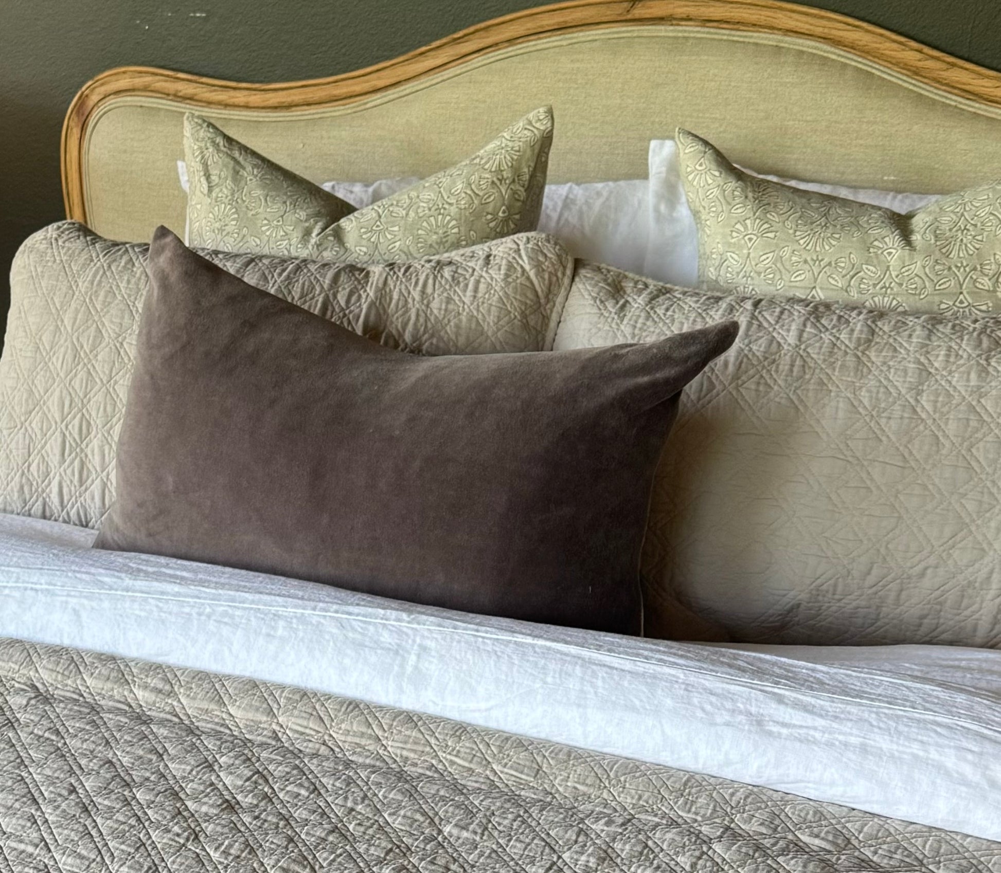 The Sumatra Artisan Block Printed Linen Green Cushion has been crafted using heavy weight pure French linen fabric. The unique design showcases charming uneven and textured effects of hand block-printing on oatmeal/natural flax linen with green tones. Styled.