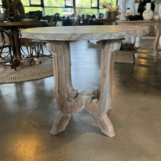 The Henri Teak Table boasts a classic design suitable for any residence. Crafted from sturdy teak wood and featuring a delicate white wash weathered finish, it adds an air of refinement to any space. Front