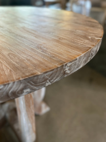 The Henri Teak Table boasts a classic design suitable for any residence. Crafted from sturdy teak wood and featuring a delicate white wash weathered finish, it adds an air of refinement to any space. Corner