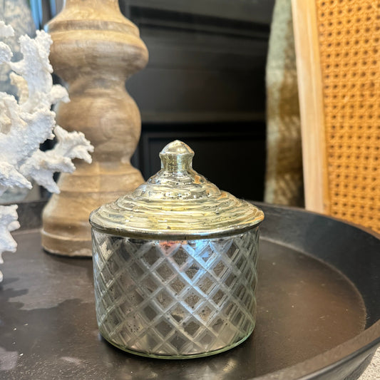 Enhance your bedroom or living space with this elegant Sophia Petite Silver Etched Glass Trinket Box. Featuring an antique-inspired design and mirrored silver and glass finish, it adds a touch of sophistication to any surface. The lid provides secure storage for your precious jewellery and other treasured mementos.