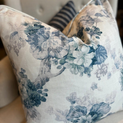 Experience ultimate comfort with the luxurious Vintage Ivory and Blue Geranium Floral Cushion. The exquisite and delicate pattern, combined with the beautiful light blue floral motif on a backdrop of ivory, creates a truly unique and luxurious piece. And with the feather insert included, you can enjoy the utmost comfort while adding a touch of elegance to any room.