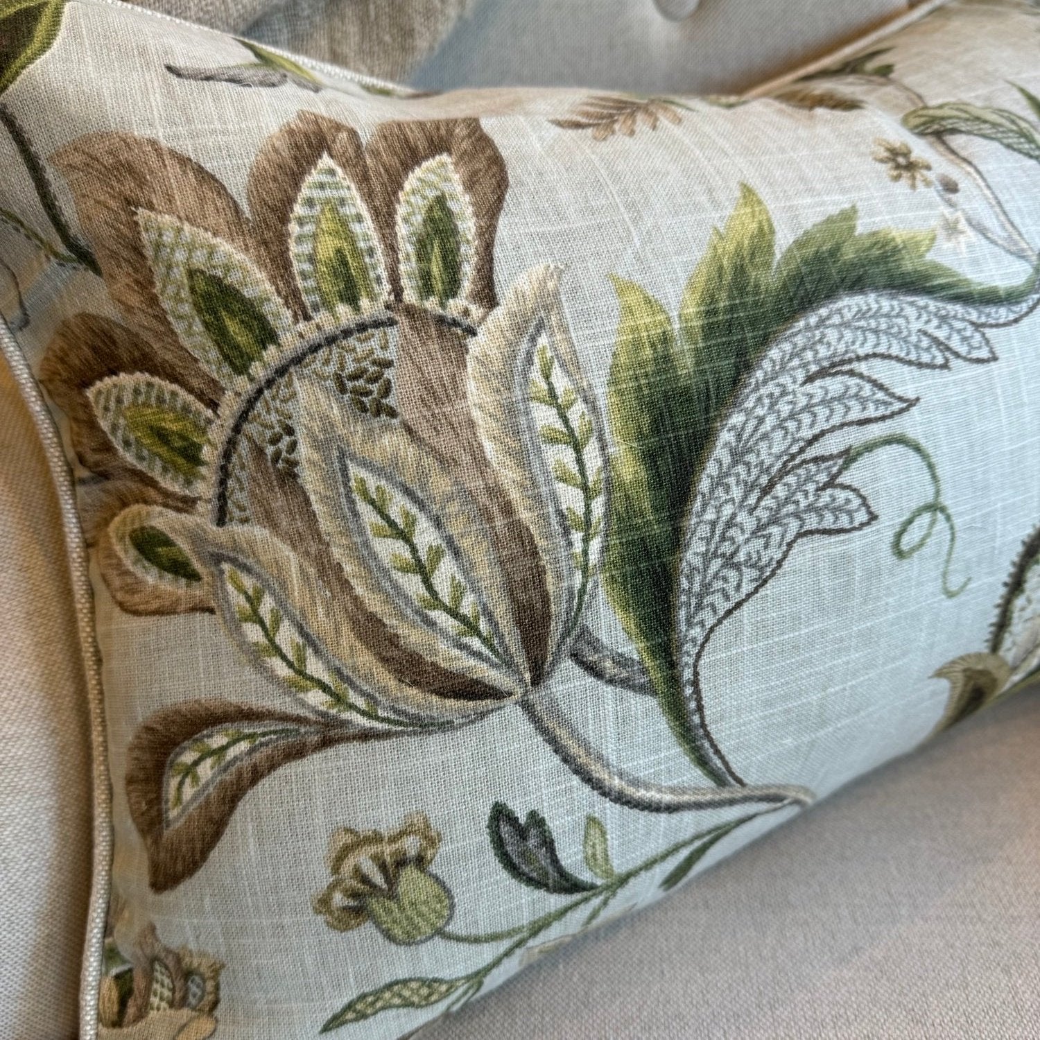 Exquisitely crafted from a sumptuous P Kaufmann heavyweight fabric – one of the world's leading fabric houses – this beautiful P Kaufmann Brissac Pastel Floral Lumbar Cushion is adorned with an exquisite pattern and delicate hues against a pale green backdrop, creating a timelessly graceful and elegant addition to any elegant home decor. Luxurious feather insert included.