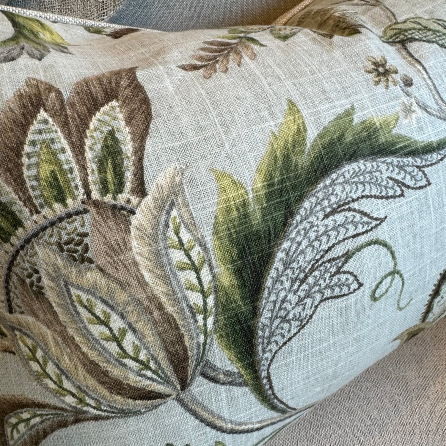 Exquisitely crafted from a sumptuous P Kaufmann heavyweight fabric – one of the world's leading fabric houses – this beautiful P Kaufmann Brissac Pastel Floral Lumbar Cushion is adorned with an exquisite pattern and delicate hues against a pale green backdrop, creating a timelessly graceful and elegant addition to any elegant home decor. Luxurious feather insert included.