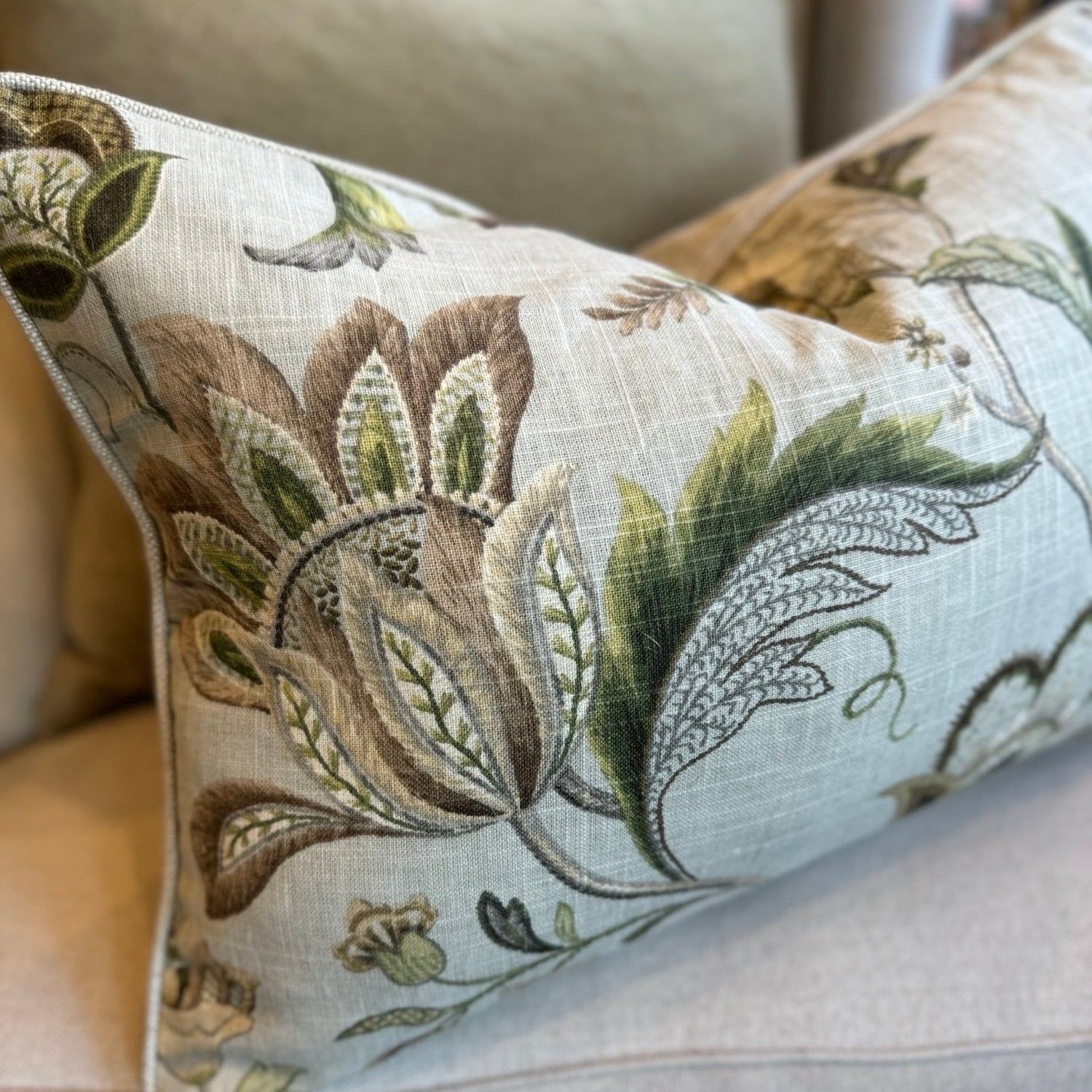 Exquisitely crafted from a sumptuous P Kaufmann heavyweight fabric – one of the world's leading fabric houses – this beautiful P Kaufmann Brissac Pastel Floral Lumbar Cushion is adorned with an exquisite pattern and delicate hues against a pale green backdrop, creating a timelessly graceful and elegant addition to any elegant home decor. Luxurious feather insert included.