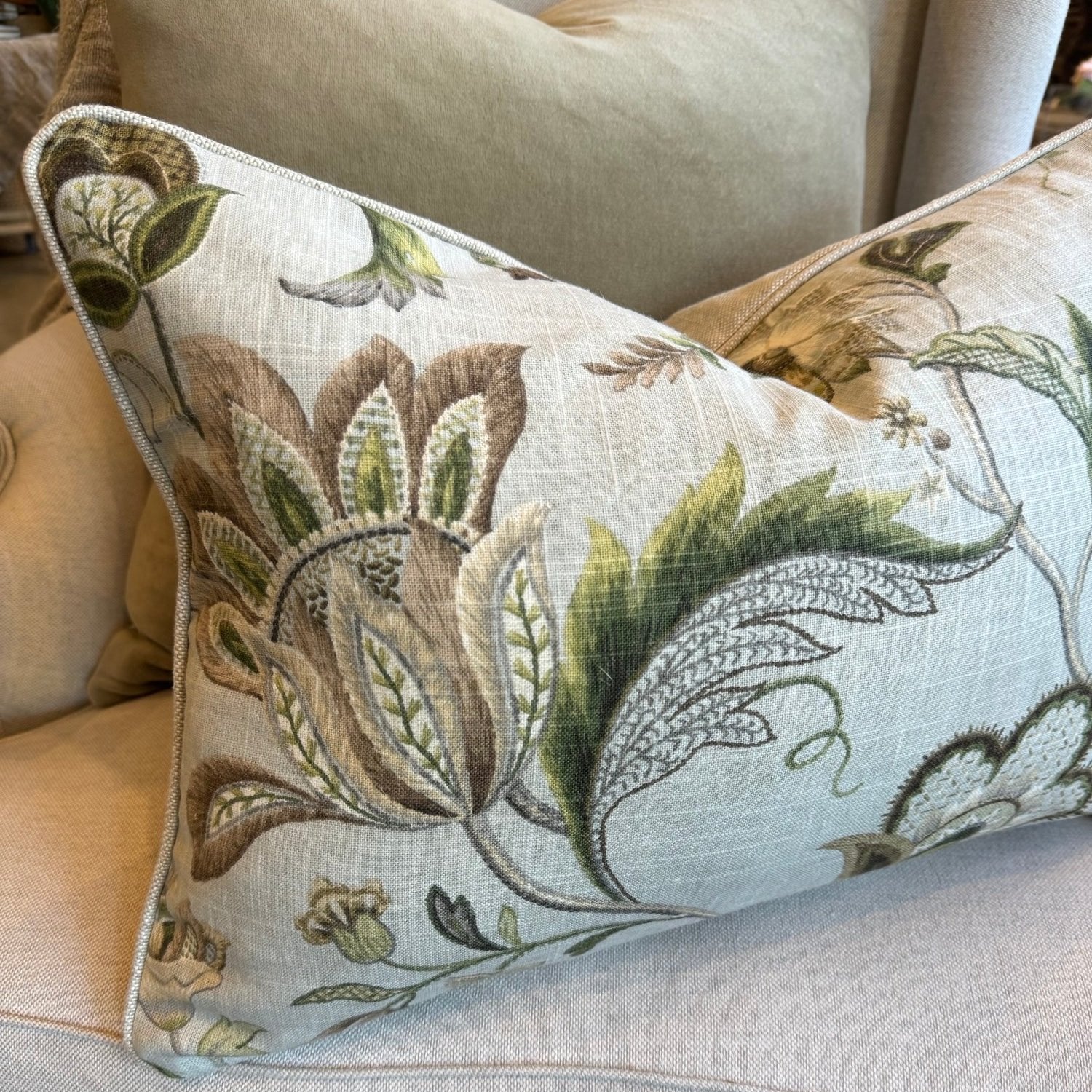 Exquisitely crafted from a sumptuous P Kaufmann heavyweight fabric – one of the world's leading fabric houses – this beautiful P Kaufmann Brissac Pastel Floral Lumbar Cushion is adorned with an exquisite pattern and delicate hues against a pale green backdrop, creating a timelessly graceful and elegant addition to any elegant home decor. Luxurious feather insert included.