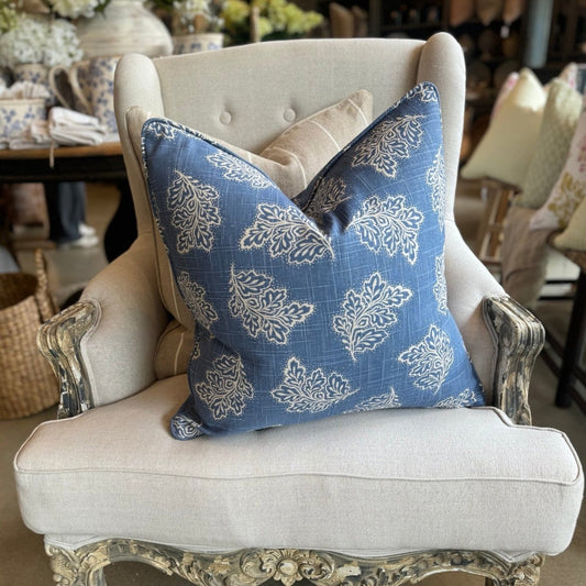 Add a touch of charm to your space with the Emmeline Blue Textured Linen Patterned Cushion. This versatile cushion can elevate the style of a casual tv room or add flair to a formal living room or bedroom. And with its feather insert, you can be sure to relax in ultimate comfort.