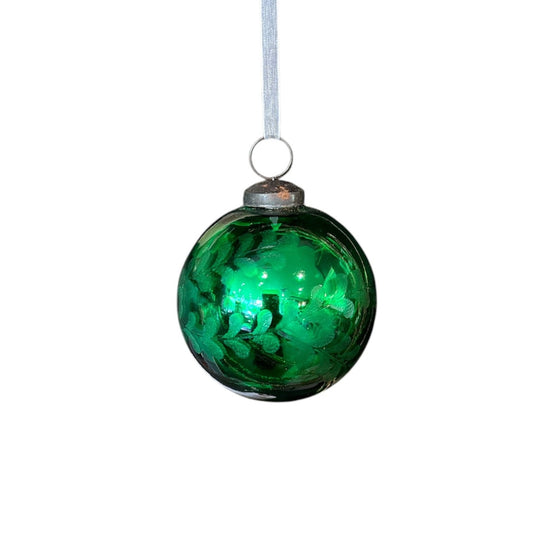 Experience effortless elegance with the Emerald Satin Hanging Christmas Ball. Crafted from glass and finished in a vibrant hue, this ornament adds depth and vibrancy to your holiday decor.