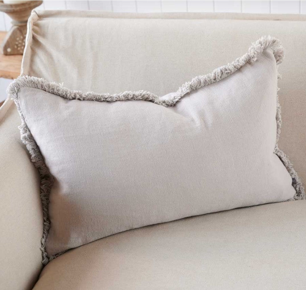Indulge in the ultimate comfort with the Avery Linen Silver Grey Lumbar Cushion, made with 100% European Linen and adorned with a soft cotton fringe. The plump feather insert adds a touch of luxury, making it the most comfortable option available.
