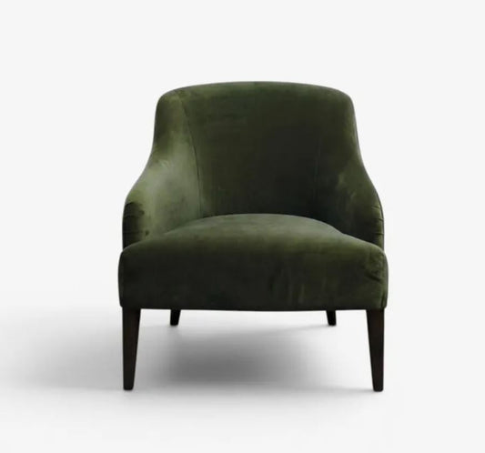 Green armchair on a white background