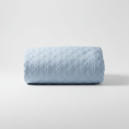 The Marseilles Double Diamond 100% cotton quilt exudes both comfort and style. Featuring an elegant soft blue tone and timeless pattern with intricate cross stitching, it's sure to add a touch of elegance to your bedroom. Crafted with soft and luxurious 100% cotton fabric and wadding, it's also conveniently machine washable on a delicate cycle.