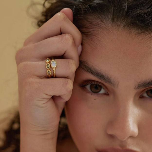 The Maya Ring combines understated elegance with distinctive character. Featuring a hammered gold finish and three bezel-set marquise Apatite stones, this refined piece transitions effortlessly from solo wear to layered styling. A timeless addition to any collection.