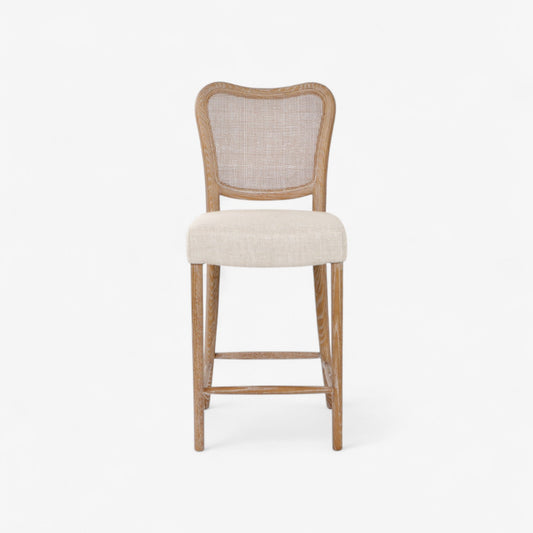 Bar stool with wooden frame and beige cushioned seat on a white background