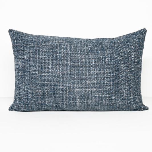 A rectangular throw pillow in a textured blue and white woven fabric, shown against a plain white background.