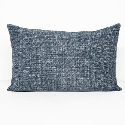 A rectangular throw pillow in a textured blue and white woven fabric, shown against a plain white background.