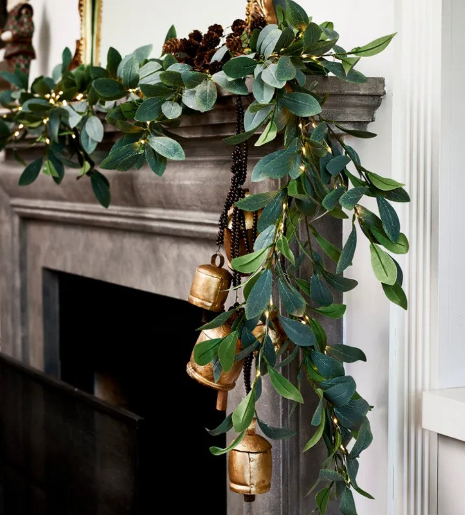 Lush and graceful, the Faux Olive Light Up Garland offers a timeless look with a unique, whimsical twist. Constructed from high-quality materials, this piece provides a realistic effect of olive branches while boasting a 100 LED chain lights for added warmth and illumination. Perfect for your décor, this garland looks stunning on a staircase, mantle, or along the dinner table. Styled.