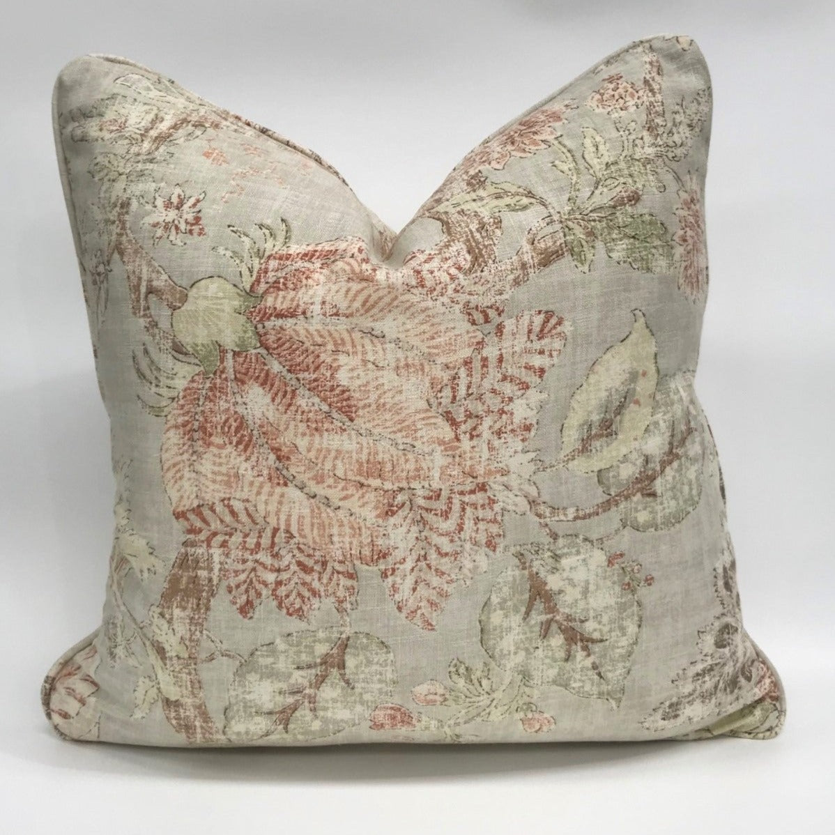 Exquisitely crafted from a sumptuous heavyweight fabric from P Kaufmann – one of the world's leading fabric houses – this beautiful Komoda Sage Floral Cushion is adorned with an exquisite pattern of soft florals and delicate hues against a pale green backdrop, creating a timelessly graceful and elegant addition to any elegant home decor. Luxurious feather insert included. Front.