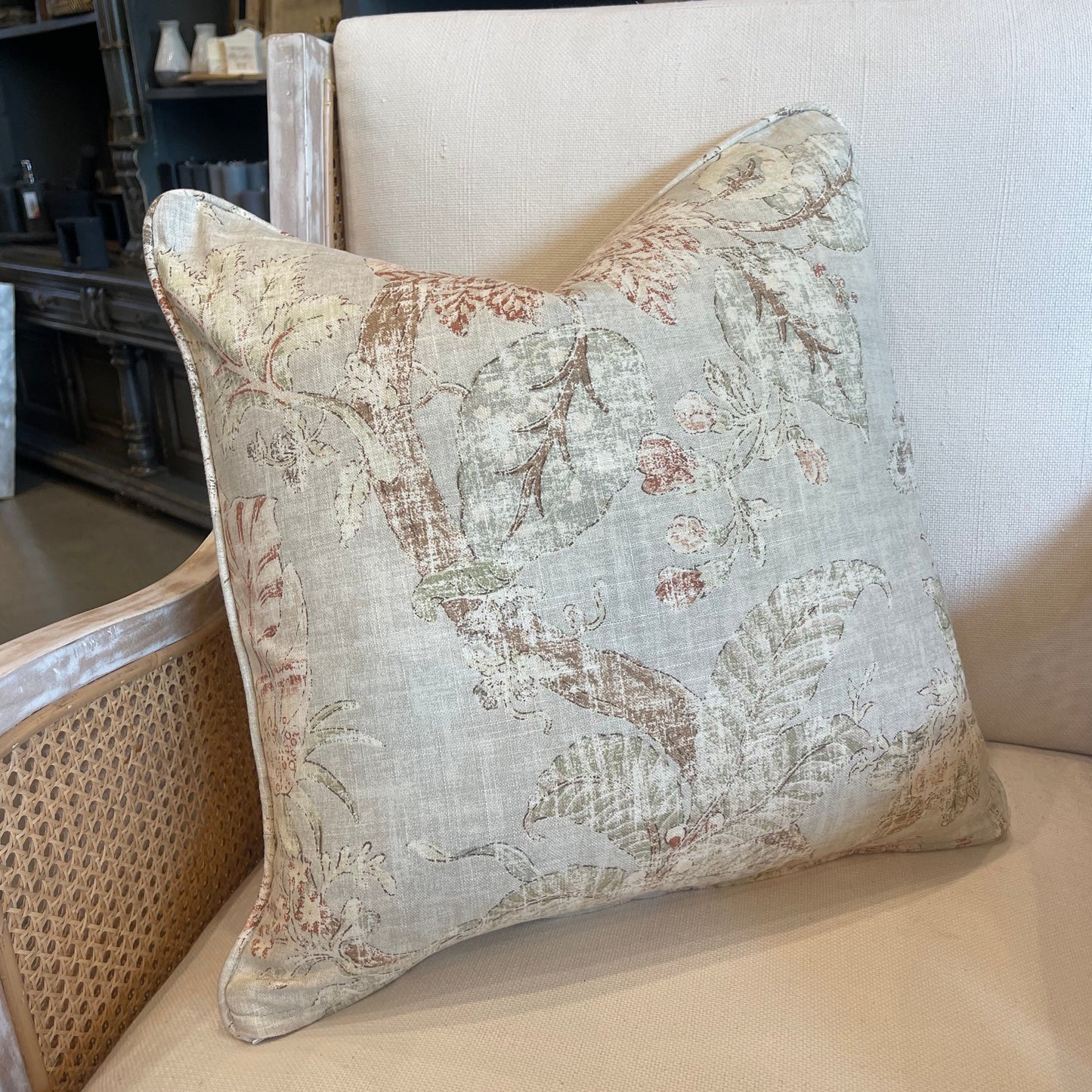 Exquisitely crafted from a sumptuous heavyweight fabric from P Kaufmann – one of the world's leading fabric houses – this beautiful Komoda Sage Floral Cushion is adorned with an exquisite pattern of soft florals and delicate hues against a pale green backdrop, creating a timelessly graceful and elegant addition to any elegant home decor. Luxurious feather insert included.