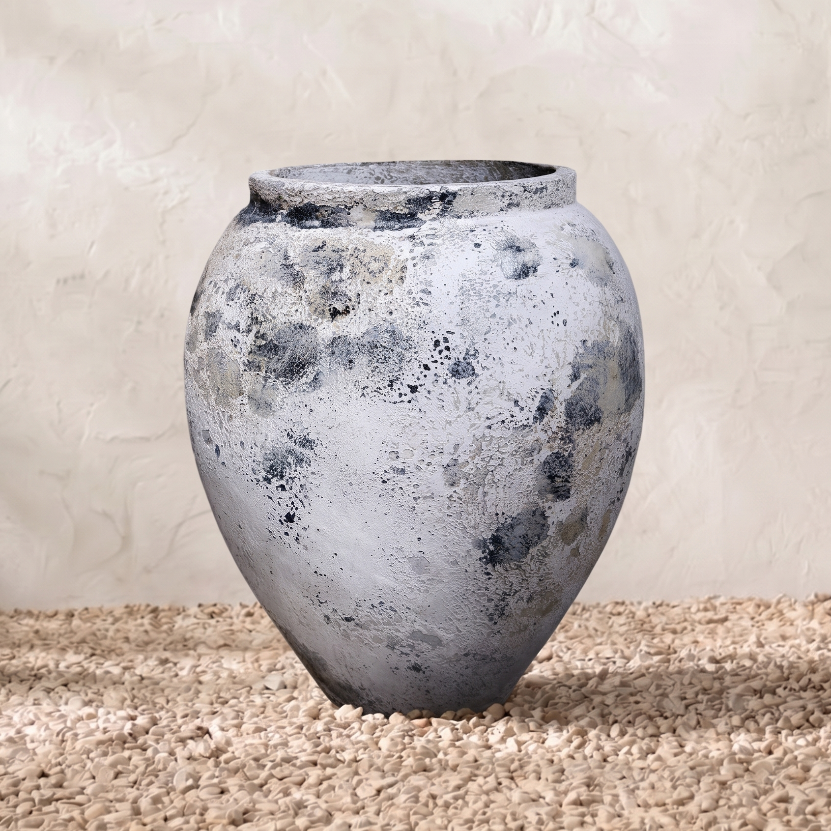 Textured gray vase on a neutral background