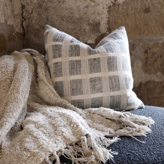 An embodiment of understated elegance, the Chloe Linen Criss-Cross Cushion is inspired by the cobbles stones of Greece, featuring a luxe weave and stylish pattern that captures the eye. Add the matching throw and other pieces from our collection to create a beautiful ensemble, or let the cushion stand on its own. Filled with the exclusive, ultra-comfortable plump feather insert , crafted from linen/cotton yarn dyed check and is OEKO-TEX® and GOTS certified. Styled.