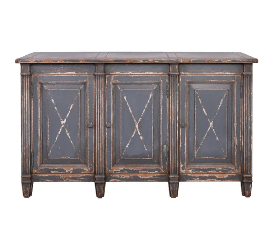 Meticulously crafted from reclaimed timber and adorned with a distressed blue paint finish, this one-of-a-kind sideboard adds versatility to any space. Whether in a dining room, bedroom, or elegant hallway, its three doors offer ample storage. Front