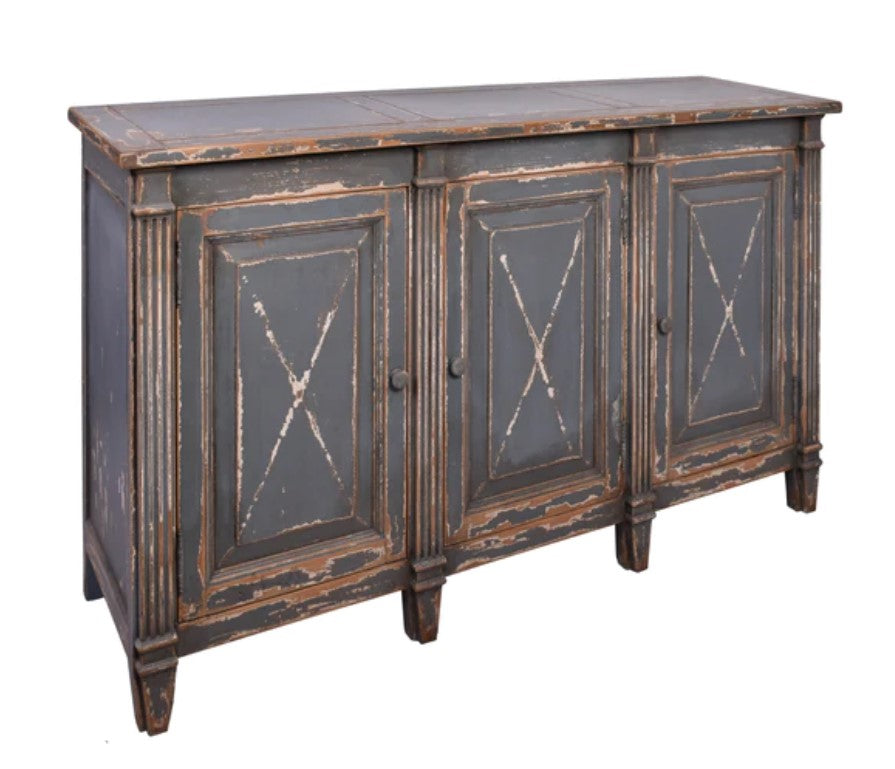 Meticulously crafted from reclaimed timber and adorned with a distressed blue paint finish, this one-of-a-kind sideboard adds versatility to any space. Whether in a dining room, bedroom, or elegant hallway, its three doors offer ample storage. Front