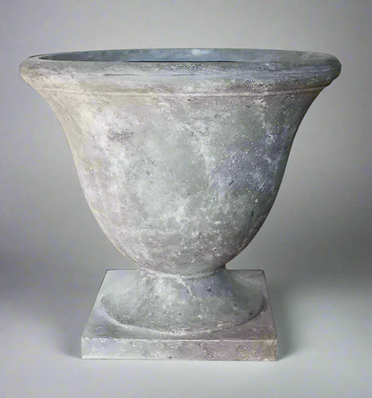 Experience the timeless beauty of European design with our Brittany Footed Grey Urn. This stunning urn features a wide bell shape and a raw grey colour, exuding elegance and sophistication. Perfect for any outdoor space, this lightweight and versatile planter adds a touch of class and charm.

Suitable for planting, indoor or outdoor use.