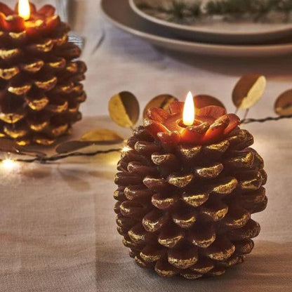 Transform your living space into a cozy and inviting haven with our Pinecone Warm White LED Candles. These elegant candles provide the charm of wax paired with the soothing glow of LED lights, adding a touch of festivity and elegance to any indoor environment. Perfect for your holiday dining table or mantle, they even come with a convenient 6-hour timer built in.