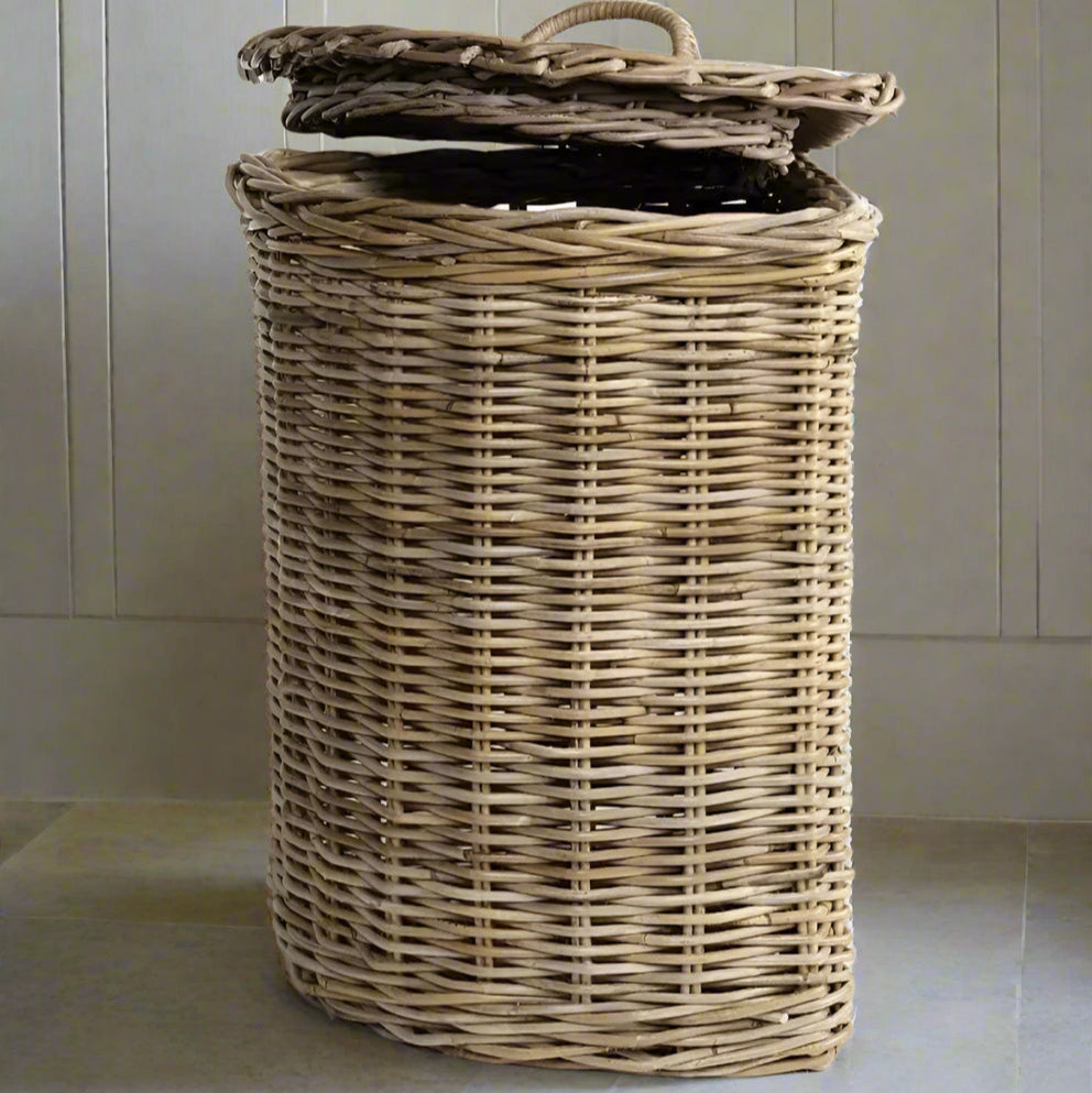 Transform your laundry routine with our expertly handcrafted rattan laundry basket, combining strength and style. Its corner design and lid with handle make it both functional and charmingly rustic, perfect for saving space and adding a touch of elegance to your home.