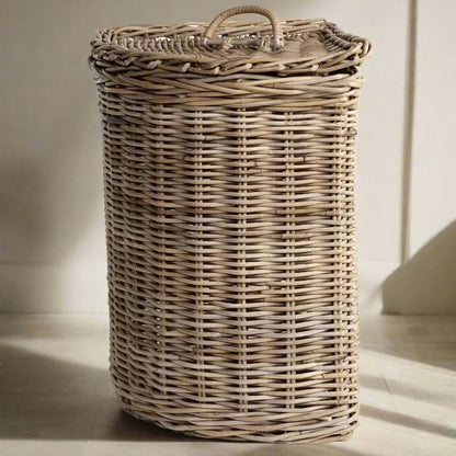 Transform your laundry routine with our expertly handcrafted rattan laundry basket, combining strength and style. Its corner design and lid with handle make it both functional and charmingly rustic, perfect for saving space and adding a touch of elegance to your home.