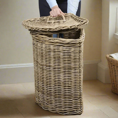 Transform your laundry routine with our expertly handcrafted rattan laundry basket, combining strength and style. Its corner design and lid with handle make it both functional and charmingly rustic, perfect for saving space and adding a touch of elegance to your home.